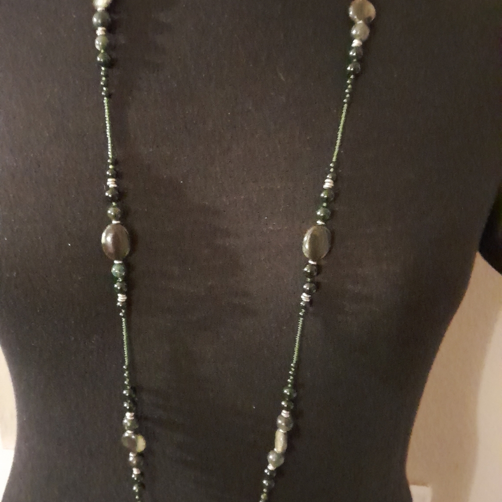 Beautiful colors beads and stones necklace very long and the stones are beautifu